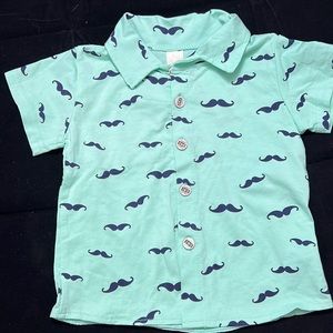 Boys Mint Green collared shirt with a mustache print. Size 12-18 months